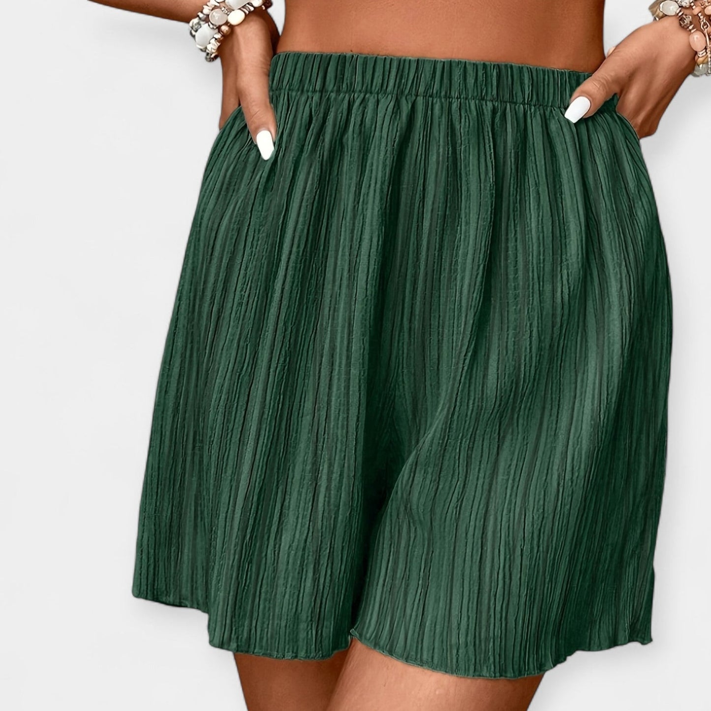 Elegante nederdelshorts med plisseringer